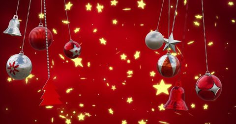 Festive Christmas Decorations Hanging on Red Background - Download Free Stock Images Pikwizard.com