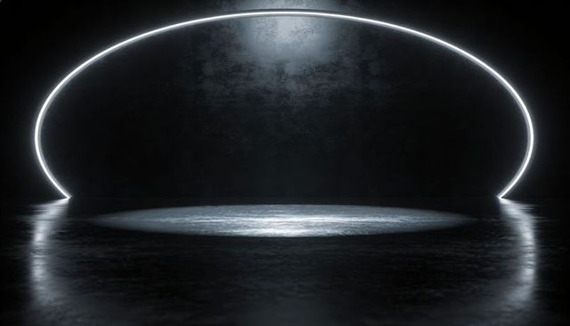 Illuminating Futuristic Semicircular LED Arch with Spotlit Circular Stage and Reflections