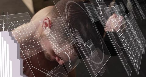 Leaning mid-adult man inspecting holographic analytics panels in dim lab with gauges
