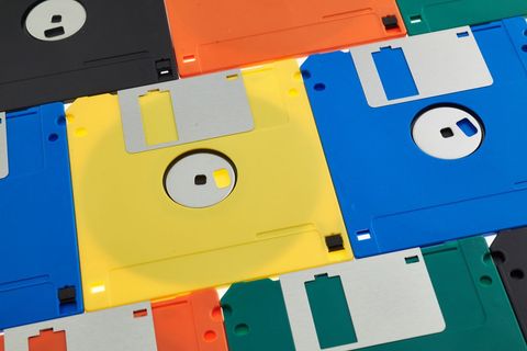 Displaying colorful 3.5-inch floppy disks in retro grid pattern for tech nostalgia