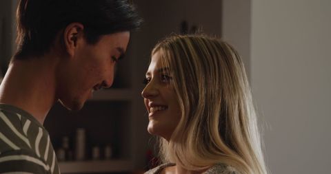 Couple Embracing in Intimate Home Setting