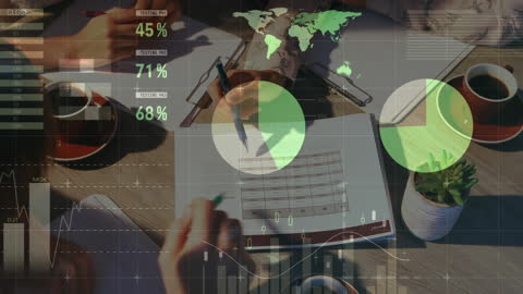 Business Colleagues Analyzing Analytics and Graphs