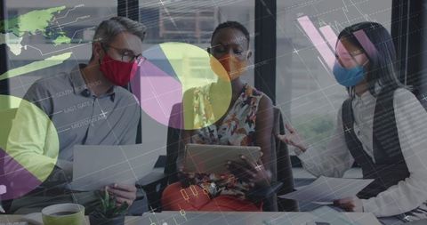 Business Team Analyzing Data with Overlaid Financial Charts