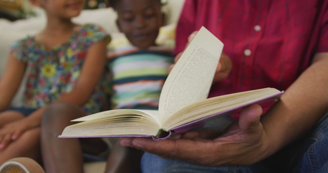 Grandparent Reading Storybook to Grandchildren on Couch - Download Free Stock Images Pikwizard.com