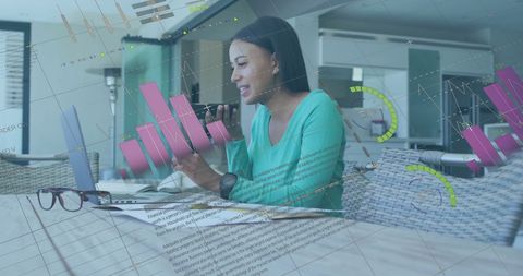 Businesswoman Analyzing Digital Finance Graphs with Smartphone - Download Free Stock Images Pikwizard.com