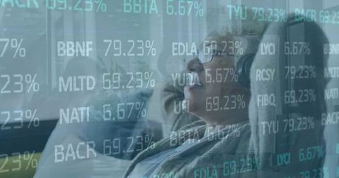 Senior Man Analyzing Financial Data Through Virtual Interface