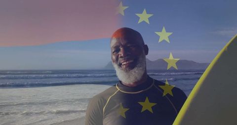 Smiling Man with Surfboard Beneath European Union Stars at Seaside