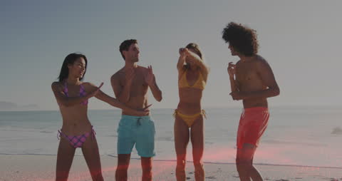 Diverse Friends Enjoying Beach Vacation on Sunny Day