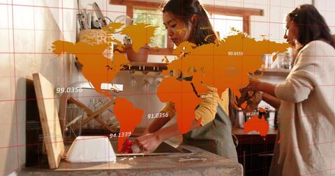 Woman rinsing dishes with family teamwork in bright kitchen, world map infographic overlay