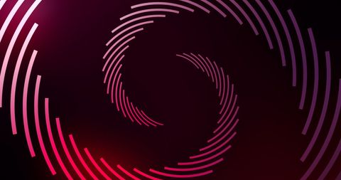 Vibrant pink light spiral on dark background