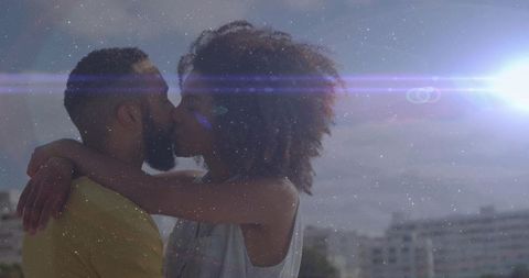 Romantic Couple Embracing on City Rooftop Holiday Soft Kiss