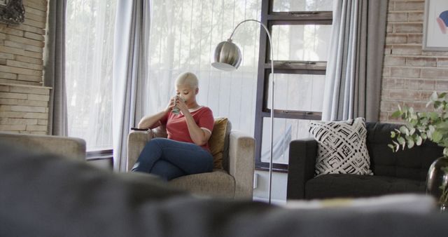 White-Haired Woman Enjoying Coffee in Modern Living Room - Download Free Stock Images Pikwizard.com