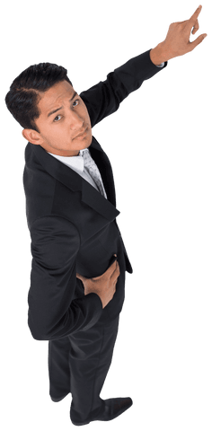 Serious Asian Businessman Pointing Upwards on Transparent Background - Download Free Stock Videos Pikwizard.com