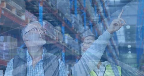 Diverse Workers Analyzing Financial Data in Modern Warehouse