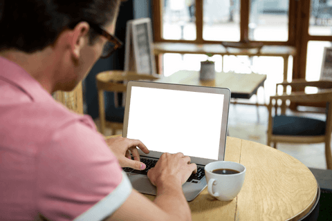 man using laptop with transparent screen in cozy cafe - Download Free Stock Videos Pikwizard.com