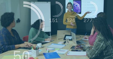 Data analyst leading team meeting on business innovation