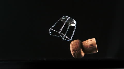 Champagne Cork in Mid-Air Displaying a Pop Celebration