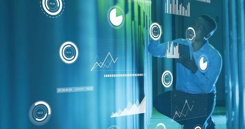 Analyst working with financial data in high-tech server room