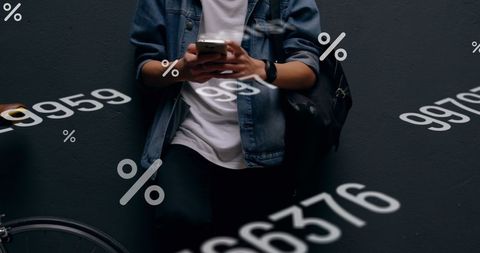Young Man Engaged with Smartphone Amid Digital Overlays - Download Free Stock Images Pikwizard.com