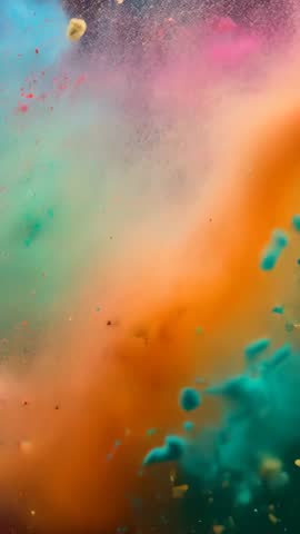 Vertical color powder explosion forming vibrant abstract particle mist for video backgrounds