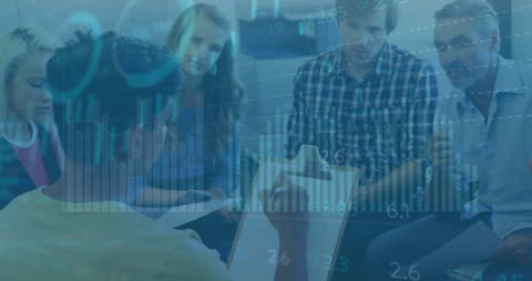 Diverse Team Discussing Business Statistics in Office