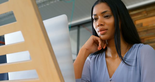 Professional Woman Working on Computer in Office Setup - Download Free Stock Images Pikwizard.com