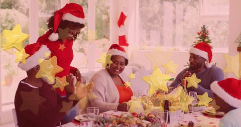 Family Celebrating Christmas Dinner with Togetherness and Joy