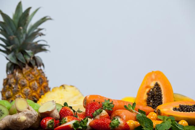 Close-up of various fresh vegetables and fruit on table - diet concept