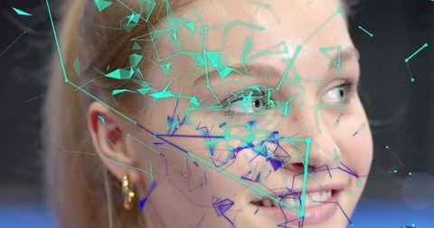 Gazing adult female with turquoise geometric mesh overlay mapping facial network closeup