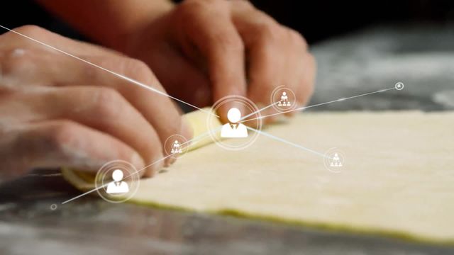 Caucasian male baker rolling pastry dough with an animated overlay representing network connections and technology integration. Perfect for illustrating the fusion of traditional cooking and modern digital advancements. Suitable for use in food industry presentations, cooking blogs, technology articles focusing on advances in culinary methods, and advertisements featuring innovative food practices.