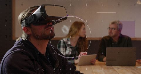 Team Meeting with Futuristic Virtual Interface and Binary Data