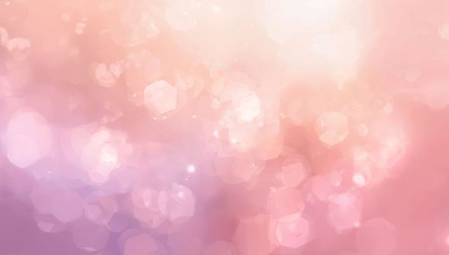 Soft pastel pink bokeh glow with hexagonal lens highlights for elegant designs