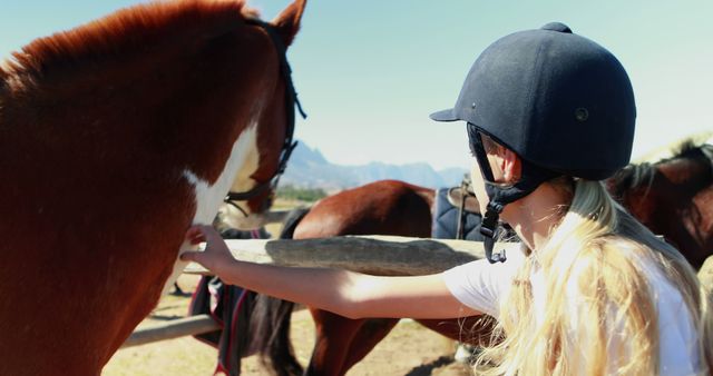 Blonde Equestrian Preparing Horse for Riding - Download Free Stock Images Pikwizard.com