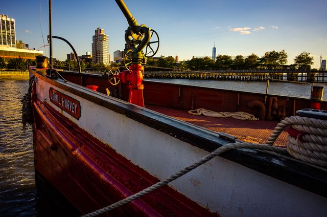 Historic Red Boat Moored at City Pier during Sunset - Download Free Stock Images Pikwizard.com