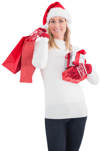 cheerful woman with christmas gifts and santas hat, isolated on transparent - Download Free Stock Videos Pikwizard.com
