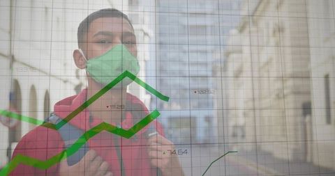 Indian commuter wearing green mask holding backpack in alley with financial growth graphs