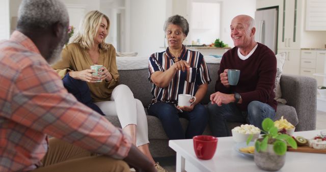 Senior Friends Enjoying Conversation and Coffee at Home - Download Free Stock Images Pikwizard.com