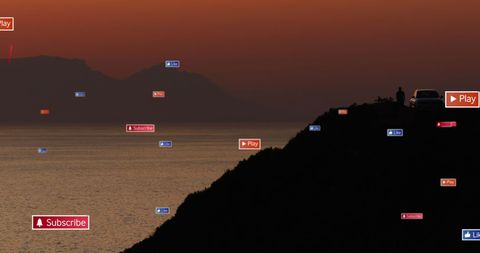Social Media Icons in Sunset Overlooking Ocean