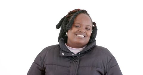 Smiling Woman in Winter Coat on Crisp Day