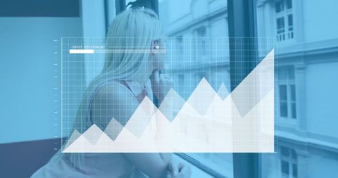 Businesswoman Analyzing Growth in Modern Office Environment