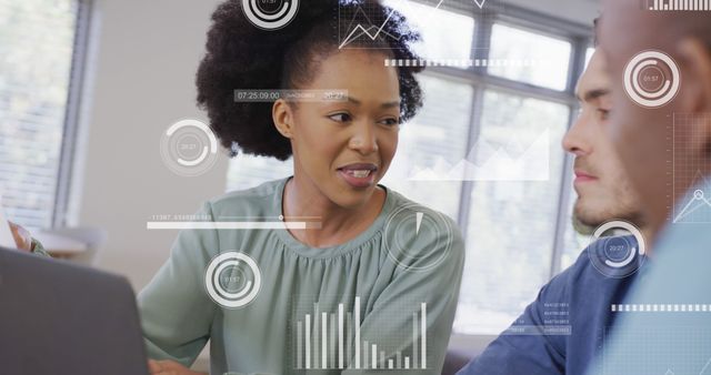 African American Female Entrepreneur Analyzing Data with Colleague - Download Free Stock Images Pikwizard.com