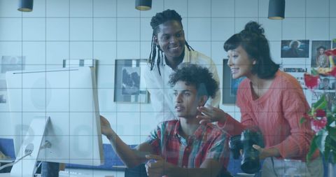 Diverse creative team collaborating on digital project