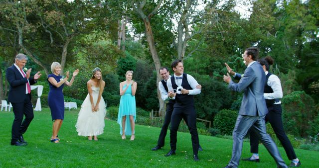 Outdoor Wedding Celebration with Bride, Groom, and Guests Clapping - Download Free Stock Images Pikwizard.com