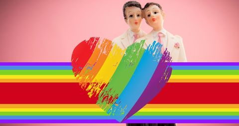 LGBT Couple Figures with Rainbow Heart Symbolizing Love and Equality