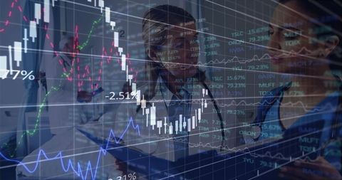 Medical Professionals Analyzing Digital Data Displays