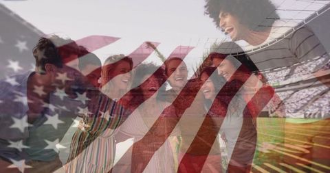Friends laughing together in stadium with faint american flag double exposure