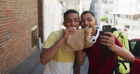 Smiling Friends Taking Selfie Sharing Snack Backpacking Adventure - Download Free Stock Images Pikwizard.com