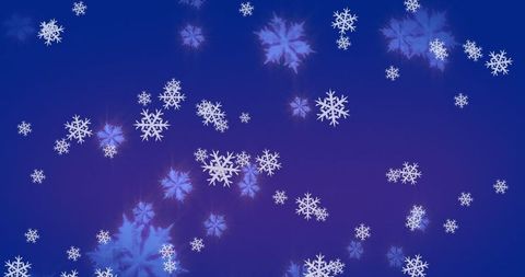 Enchanted snowflakes falling on deep blue backdrop