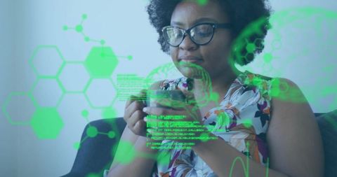 Woman relaxing on couch with futuristic holographic display