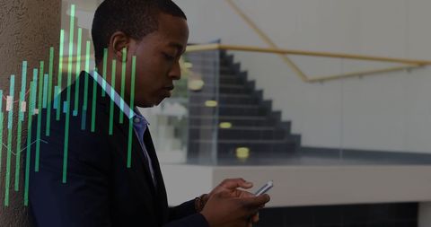 Businessman Analyzing Data on Smartphone in Modern Office Space